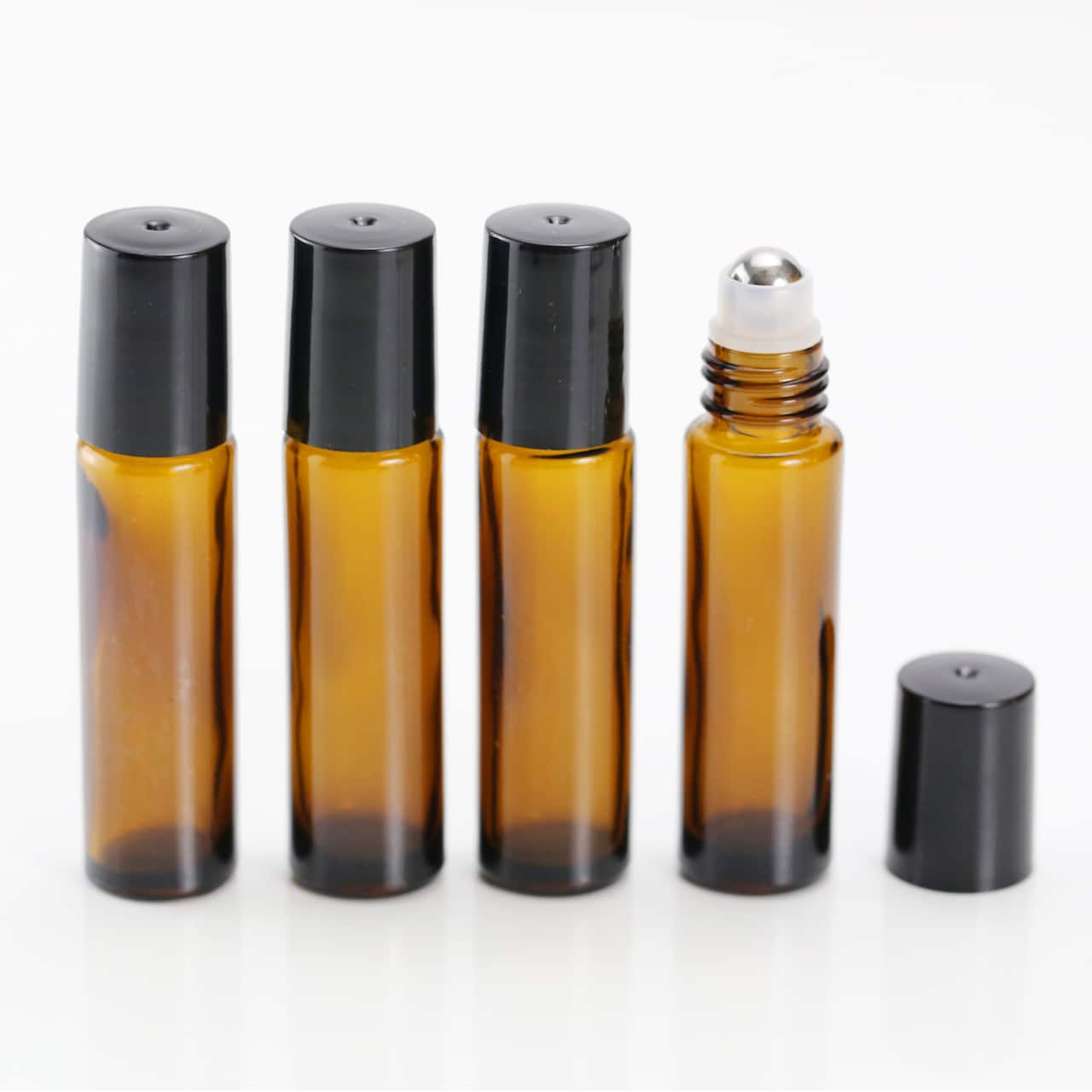 12 Packs: 4 ct. (48 total) Glass Roller Ball Bottles by Make Market®